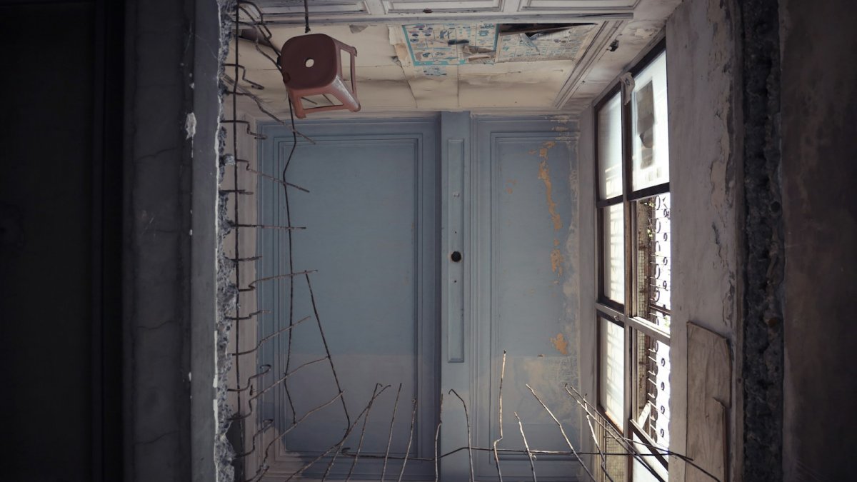 white wooden door with brown steel door